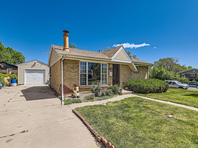 3531 E 91st Ave, Thornton, CO 80229 - ranch-style home with brick siding, a front yard, an outbuilding, a detached garage, and driveway