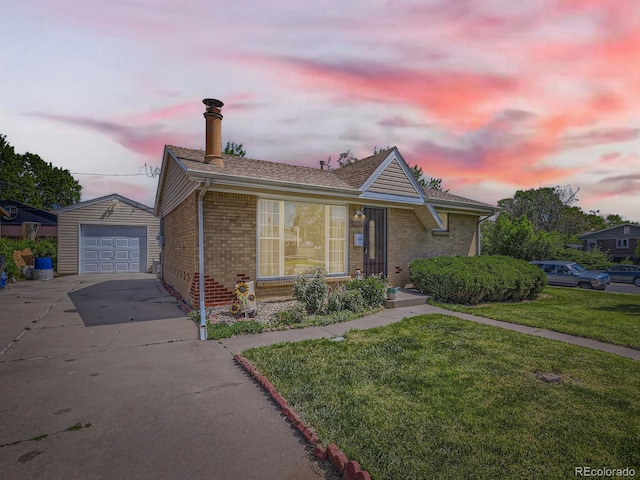 3531 E 91st Ave, Thornton, CO 80229 - ranch-style house featuring brick siding, a front yard, an outbuilding, and concrete driveway