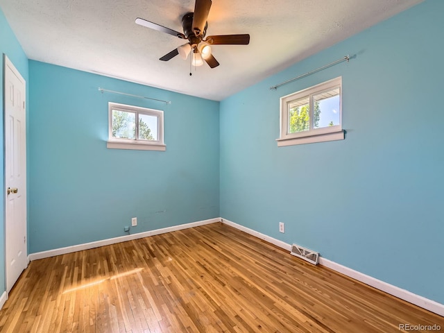 3531 E 91st Ave, Thornton, CO 80229 - unfurnished bedroom with wood-type flooring, baseboards, and ceiling fan