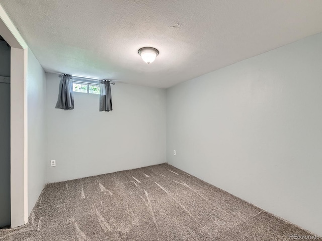 3531 E 91st Ave, Thornton, CO 80229 - basement featuring carpet floors and a textured ceiling