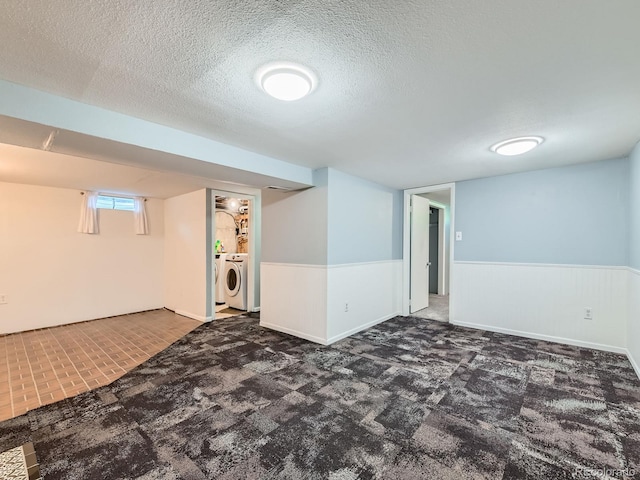 3531 E 91st Ave, Thornton, CO 80229 - below grade area with washer and dryer, wainscoting, a textured ceiling, and carpet flooring