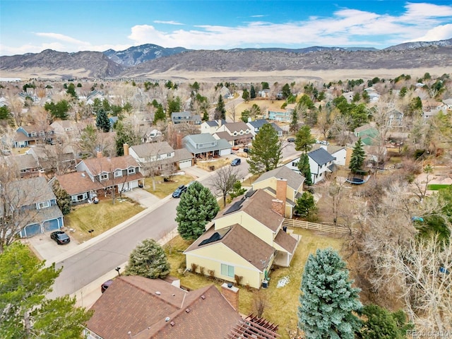 bird's eye view featuring a residential view and a mountain view