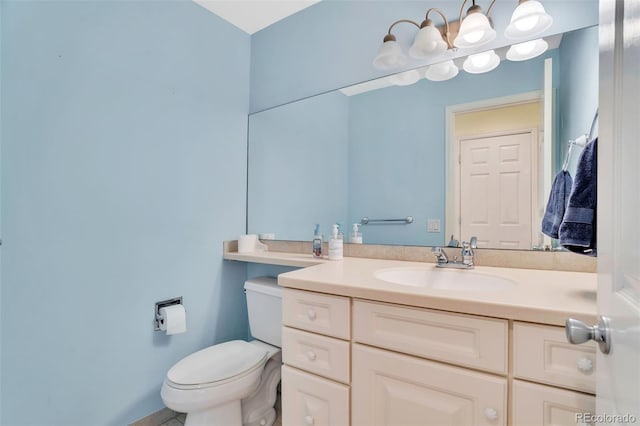 half bath with toilet and vanity