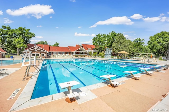 10627 Chautauga Mtn, Littleton, CO 80127 - community pool with a patio area