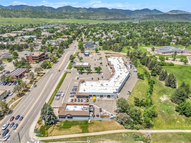 10627 Chautauga Mtn, Littleton, CO 80127 - aerial overview of property's location with a mountain backdrop