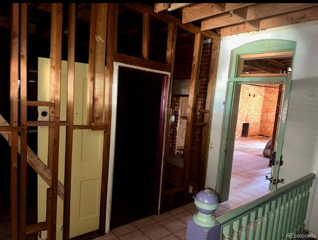 hallway with light tile patterned floors