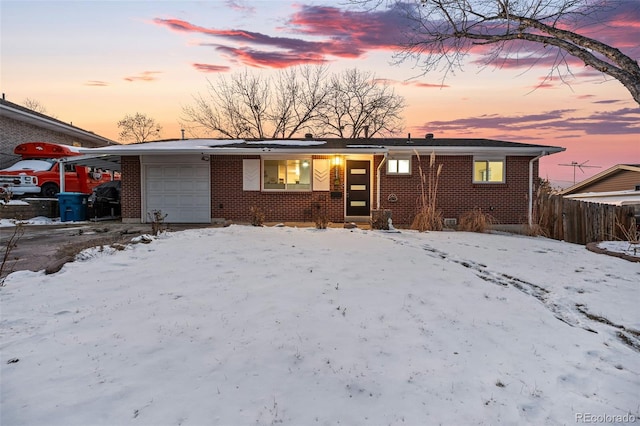 view of front of home with a garage