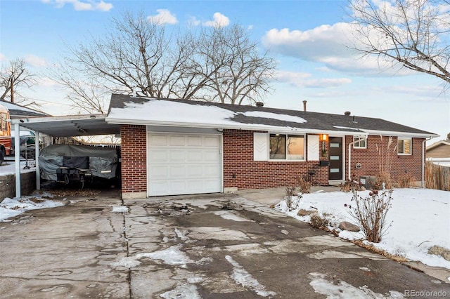 view of front of house featuring a garage and a carport