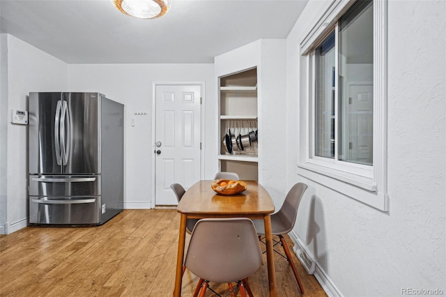 dining room featuring hardwood / wood-style flooring