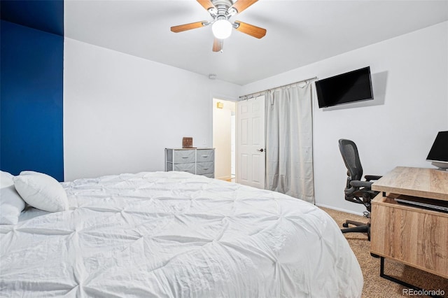 bedroom with ceiling fan and carpet floors