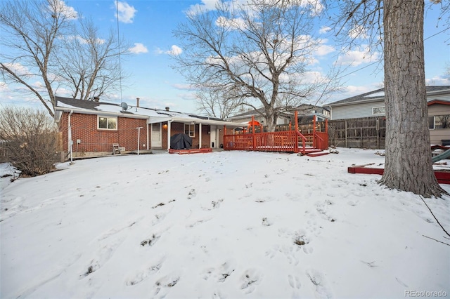 view of snow covered house