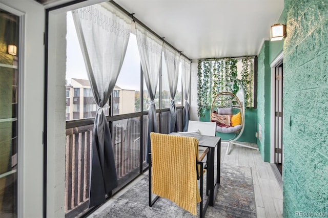 sunroom / solarium with a wealth of natural light