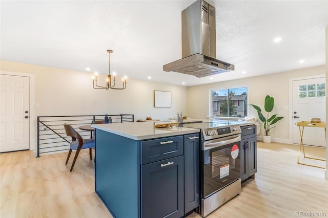 3480 E 119th St, Thornton, CO 80233 - kitchen featuring extractor fan, stainless steel electric stove, light wood-style flooring, a chandelier, and recessed lighting