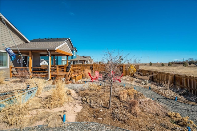 6812 Indian Paintbrush St, Frederick, CO 80530 - view of yard with a wooden deck