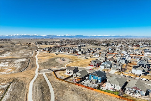 6812 Indian Paintbrush St, Frederick, CO 80530 - aerial perspective of suburban area with a mountainous background