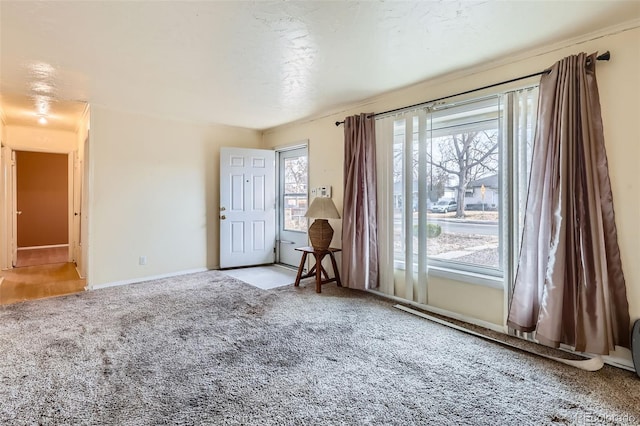 unfurnished room with light carpet