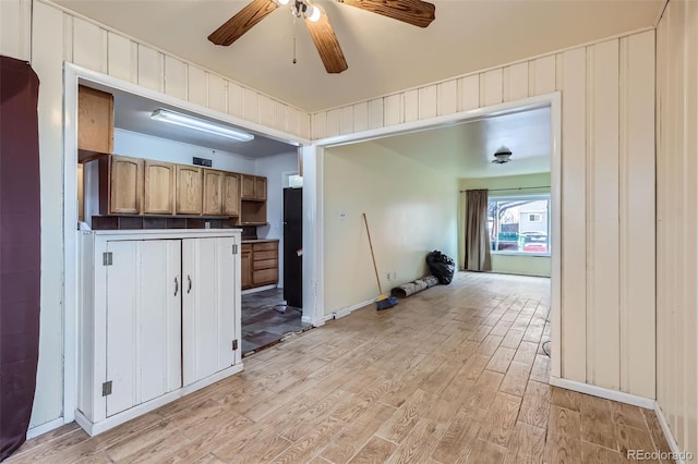 kitchen with light wood-type flooring and ceiling fan