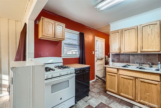 kitchen with white gas range, sink, light brown cabinets, black dishwasher, and ornamental molding