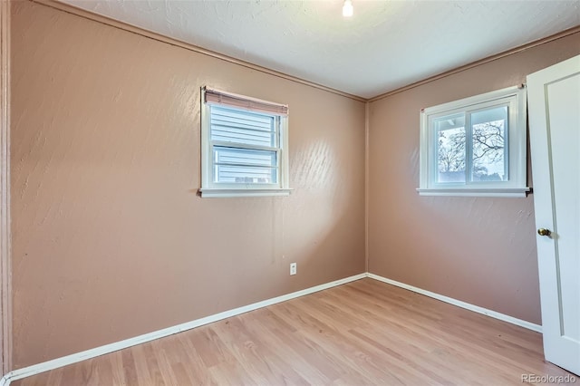 empty room featuring light hardwood / wood-style floors