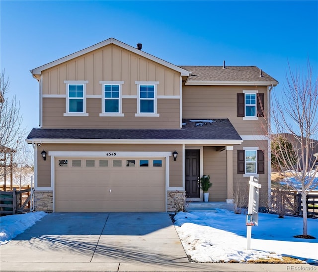 view of front of property with a garage