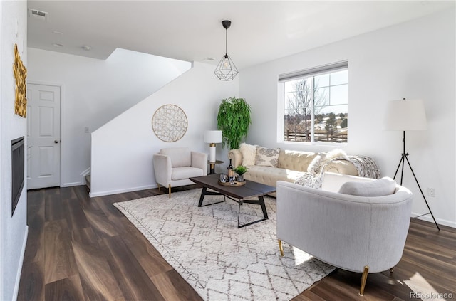 living room with dark wood-type flooring