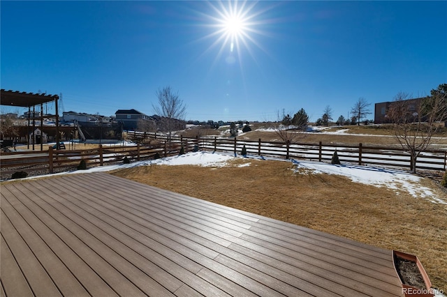 snow covered deck featuring a trampoline