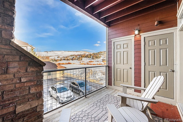 balcony featuring a mountain view