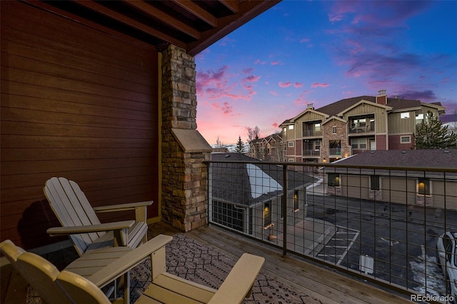 balcony at dusk with a residential view