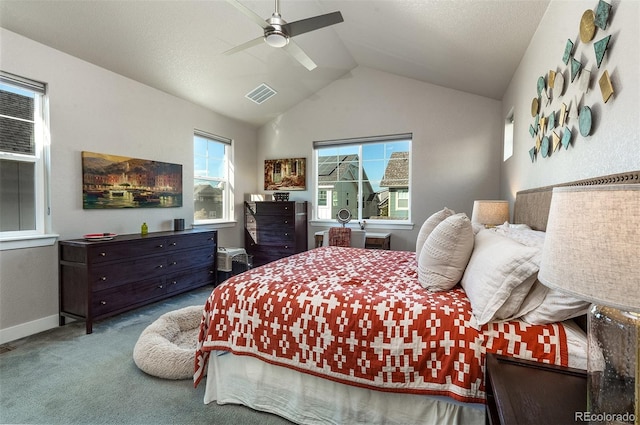 bedroom featuring ceiling fan, lofted ceiling, and carpet floors