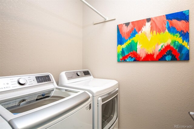 laundry area featuring washing machine and dryer