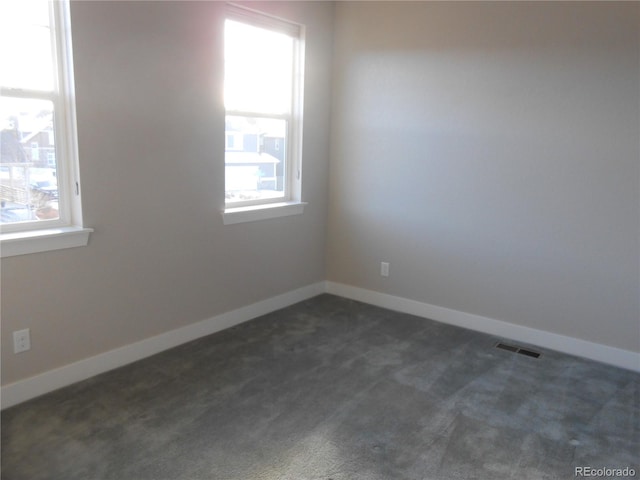 view of carpeted spare room