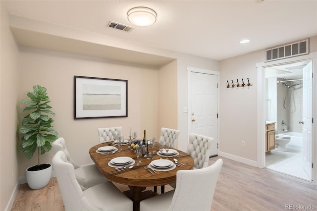 5201 S Fox St Unit 102, Littleton, CO 80120 - dining space featuring light wood-style floors and recessed lighting