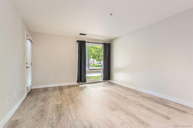 5201 S Fox St Unit 102, Littleton, CO 80120 - unfurnished room with light wood-type flooring and baseboards