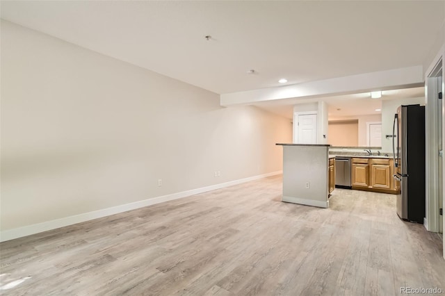 5201 S Fox St Unit 102, Littleton, CO 80120 - unfurnished living room featuring light wood-type flooring and recessed lighting