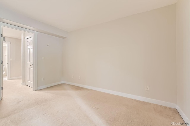 5201 S Fox St Unit 102, Littleton, CO 80120 - spare room featuring light carpet