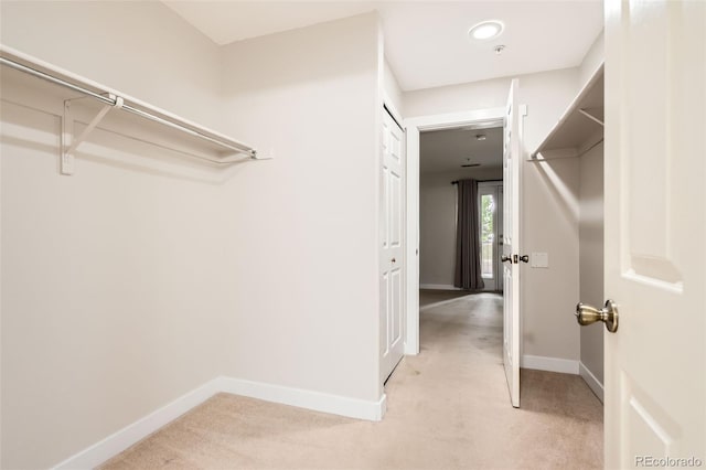 5201 S Fox St Unit 102, Littleton, CO 80120 - walk in closet featuring light carpet