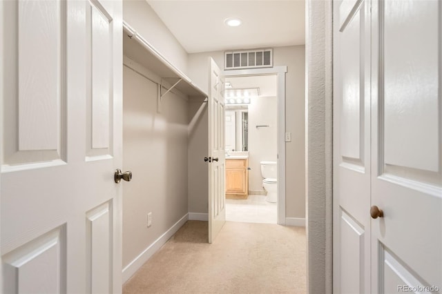 5201 S Fox St Unit 102, Littleton, CO 80120 - spacious closet featuring light colored carpet