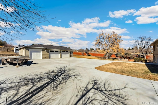 view of property exterior with a yard and an outbuilding