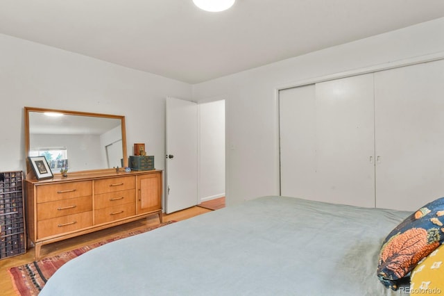 4040 Cody St, Wheat Ridge, CO 80033 - bedroom with wood finished floors and a closet