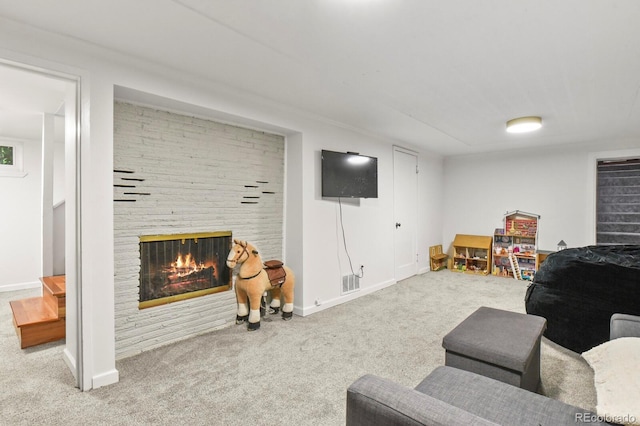 4040 Cody St, Wheat Ridge, CO 80033 - living room featuring carpet and a stone fireplace