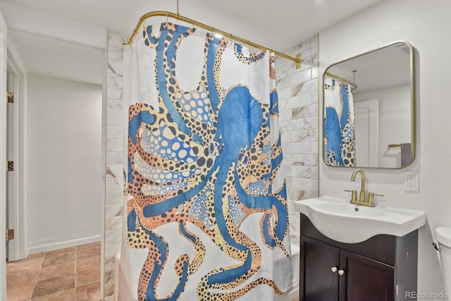 4040 Cody St, Wheat Ridge, CO 80033 - full bath with vanity and a shower with shower curtain