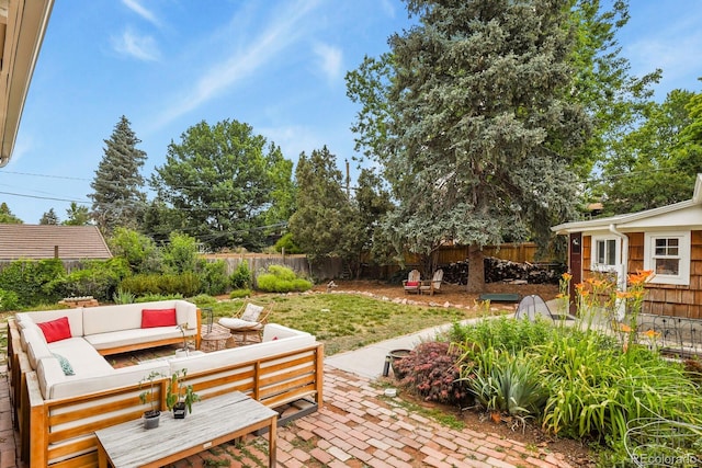 4040 Cody St, Wheat Ridge, CO 80033 - fenced backyard featuring an outdoor hangout area and a patio