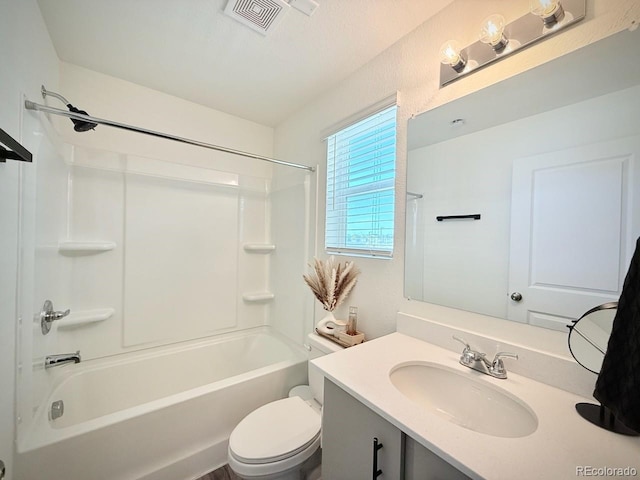 bathroom with vanity, shower / bathing tub combination, toilet, and visible vents