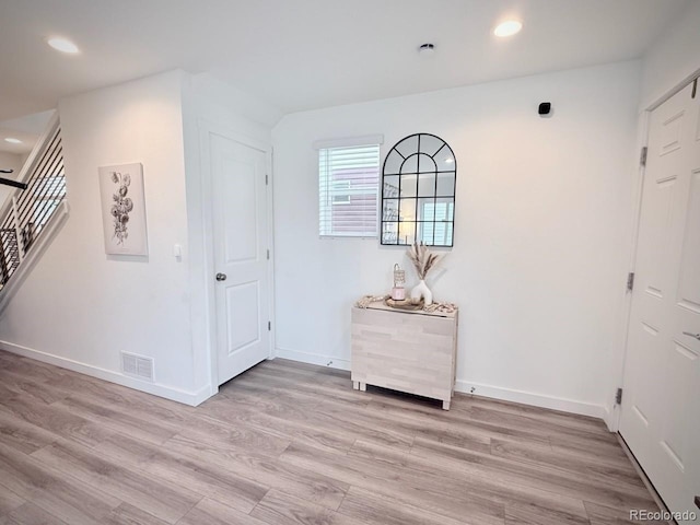 entrance foyer featuring recessed lighting, light wood-type flooring, and visible vents