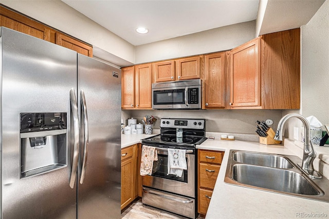 kitchen with stainless steel appliances and sink