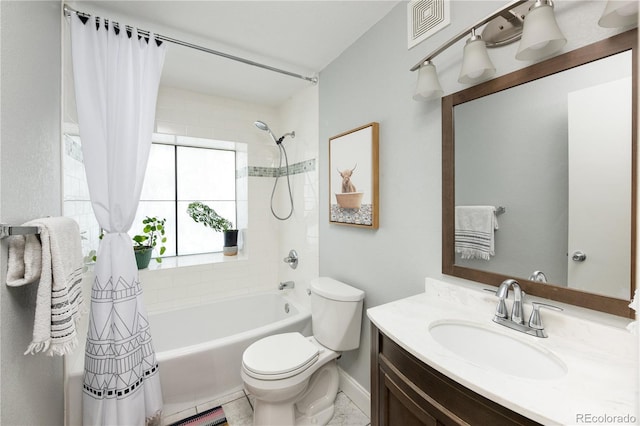 full bathroom featuring toilet, vanity, and shower / bath combination with curtain