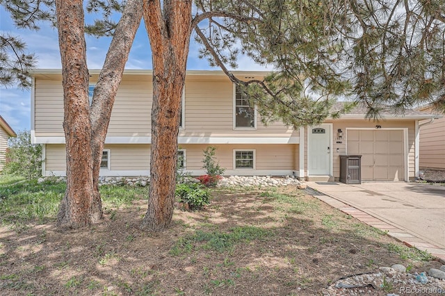 15691 E Atlantic Cir, Aurora, CO 80013 - view of front of home with concrete driveway and an attached garage