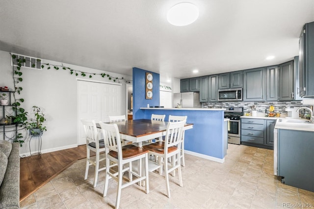 dining space with sink