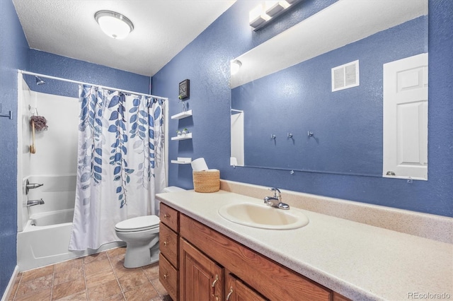 full bathroom with toilet, vanity, a textured ceiling, and shower / tub combo with curtain