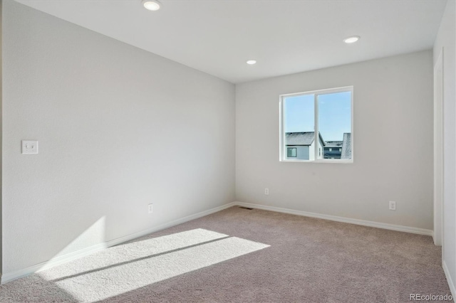 view of carpeted spare room